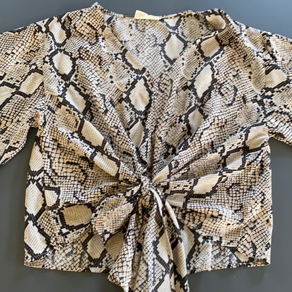 Vestique snakeskin top